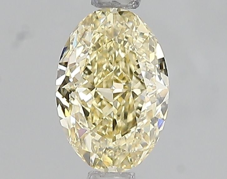 Loose Diamond - OVAL 1.07ct Fancy Intense Yellow VS2: Loose Diamond - OVAL 1.07ct Fancy Intense Yellow VS2 Source: This is a real non-mined Diamond that has been grown in a lab Shape: OVAL Carats: 1.07 Color: Fancy Intense Yellow Certification: IGI Video