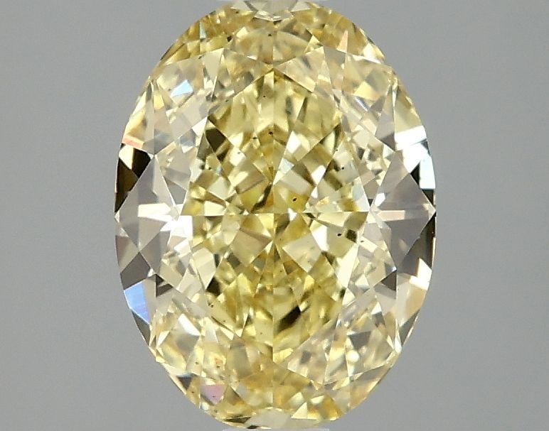 Loose Diamond - OVAL 2.1ct Fancy Vivid Yellow VS2: Loose Diamond - OVAL 2.1ct Fancy Vivid Yellow VS2 Source: This is a real non-mined Diamond that has been grown in a lab Shape: OVAL Carats: 2.1 Color: Fancy Vivid Yellow Certification: IGI Video: