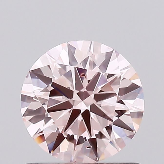 Loose Diamond - ROUND 0.72ct Fancy Pink SI1: Loose Diamond - ROUND 0.72ct Fancy Pink SI1 Source: This is a real non-mined Diamond that has been grown in a lab Shape: ROUND Carats: 0.72 Color: Fancy Pink Certification: IGI Video: