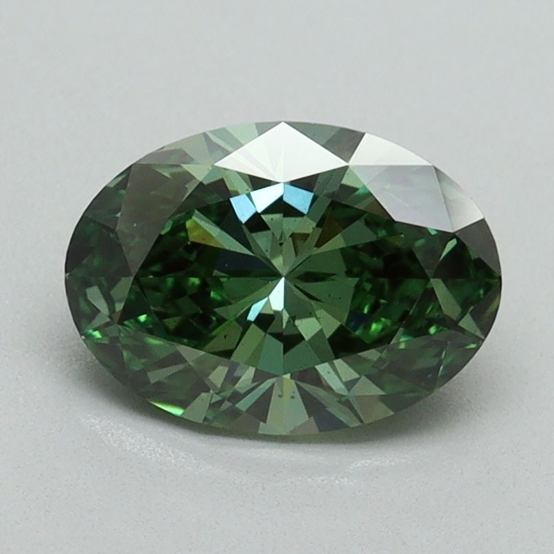 Loose Diamond - OVAL 1.22ct Fancy Vivid Green VS2: Loose Diamond - OVAL 1.22ct Fancy Vivid Green VS2 Source: This is a real non-mined Diamond that has been grown in a lab Shape: OVAL Carats: 1.22 Color: Fancy Vivid Green Certification: IGI Video: