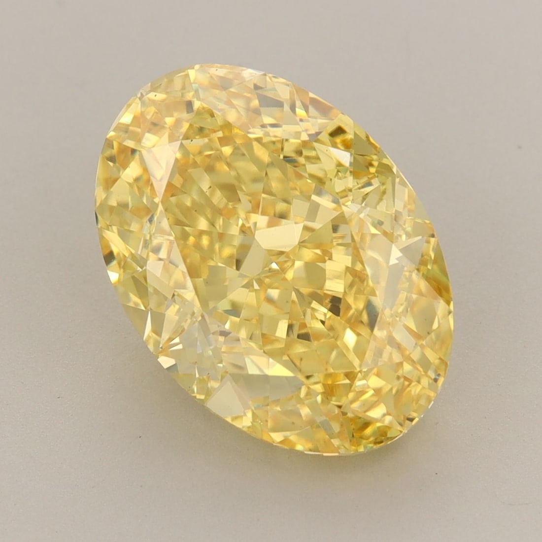 Loose Diamond - OVAL 7.06ct Fancy Vivid Yellow VS1: Loose Diamond - OVAL 7.06ct Fancy Vivid Yellow VS1 Source: This is a real non-mined Diamond that has been grown in a lab Shape: OVAL Carats: 7.06 Color: Fancy Vivid Yellow Certification: IGI Video: