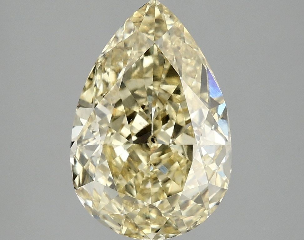 Loose Diamond - PEAR 3.07ct Fancy Vivid Yellow VS1: Loose Diamond - PEAR 3.07ct Fancy Vivid Yellow VS1 Source: This is a real non-mined Diamond that has been grown in a lab Shape: PEAR Carats: 3.07 Color: Fancy Vivid Yellow Certification: IGI Video: