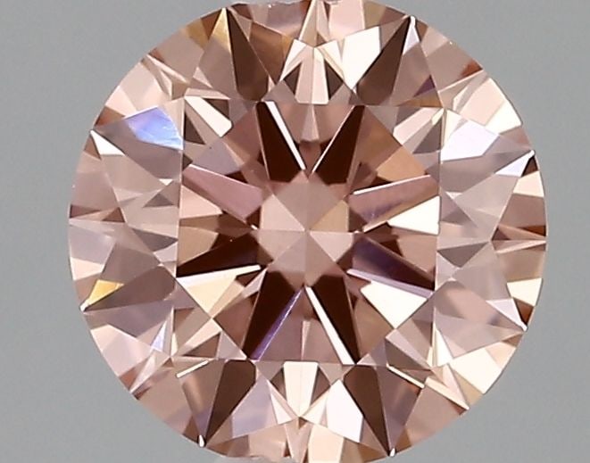 Ideal Loose Diamond - ROUND 1.17ct Fancy Vivid Pink VVS2: Ideal Loose Diamond - ROUND 1.17ct Fancy Vivid Pink VVS2 Source: This is a real non-mined Diamond that has been grown in a lab Shape: ROUND Carats: 1.17 Color: Fancy Vivid Pink Certification: IGI Vide