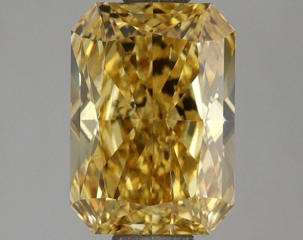 Loose Diamond - RADIANT 2.09ct Fancy Vivid Yellow SI2: Loose Diamond - RADIANT 2.09ct Fancy Vivid Yellow SI2 Source: This is a real non-mined Diamond that has been grown in a lab Shape: RADIANT Carats: 2.09 Color: Fancy Vivid Yellow Certification: NONE Vi