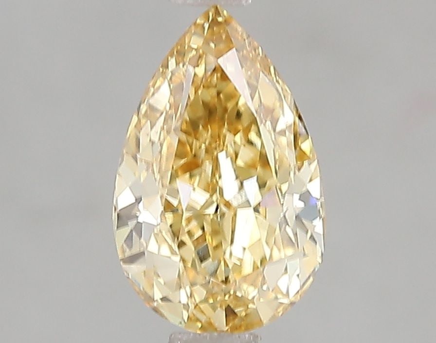 Loose Diamond - PEAR 1.5ct Fancy Vivid Yellow VS1: Loose Diamond - PEAR 1.5ct Fancy Vivid Yellow VS1 Source: This is a real non-mined Diamond that has been grown in a lab Shape: PEAR Carats: 1.5 Color: Fancy Vivid Yellow Certification: IGI Video:
