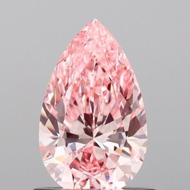 Loose Diamond - PEAR 0.9ct Fancy Vivid Pink VS2: Loose Diamond - PEAR 0.9ct Fancy Vivid Pink VS2 Source: This is a real non-mined Diamond that has been grown in a lab Shape: PEAR Carats: 0.9 Color: Fancy Vivid Pink Certification: IGI Video: