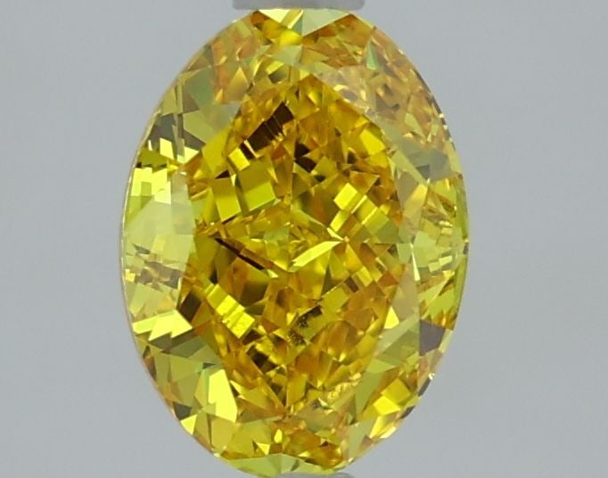 Loose Diamond - OVAL 1.56ct Fancy Vivid Yellow VVS2: Loose Diamond - OVAL 1.56ct Fancy Vivid Yellow VVS2 Source: This is a real non-mined Diamond that has been grown in a lab Shape: OVAL Carats: 1.56 Color: Fancy Vivid Yellow Certification: IGI Video: