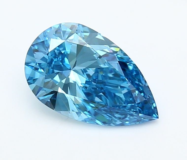 Loose Diamond - PEAR 1.49ct Fancy Vivid Blue VVS1: Loose Diamond - PEAR 1.49ct Fancy Vivid Blue VVS1 Source: This is a real non-mined Diamond that has been grown in a lab Shape: PEAR Carats: 1.49 Color: Fancy Vivid Blue Certification: IGI Video:
