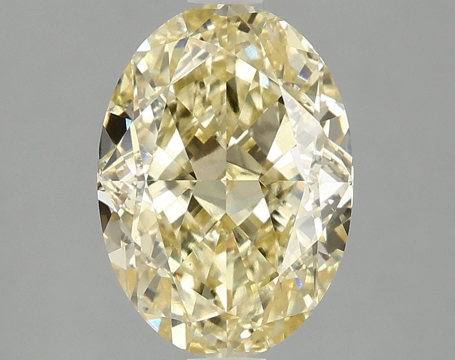 Loose Diamond - OVAL 3.05ct Fancy Vivid Yellow VS1: Loose Diamond - OVAL 3.05ct Fancy Vivid Yellow VS1 Source: This is a real non-mined Diamond that has been grown in a lab Shape: OVAL Carats: 3.05 Color: Fancy Vivid Yellow Certification: IGI Video: