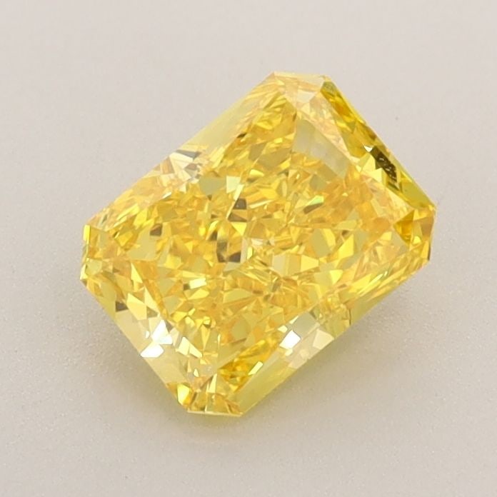 Loose Diamond - RADIANT 0.84ct Fancy Vivid Yellow VS1: Loose Diamond - RADIANT 0.84ct Fancy Vivid Yellow VS1 Source: This is a real non-mined Diamond that has been grown in a lab Shape: RADIANT Carats: 0.84 Color: Fancy Vivid Yellow Certification: IGI Vid