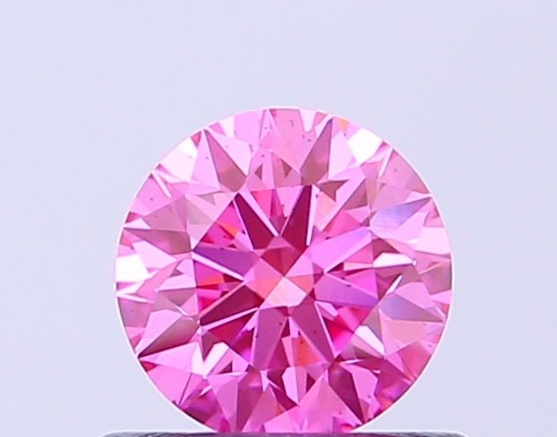 Ideal Loose Diamond - ROUND 0.5ct Fancy Vivid Pink SI1: Ideal Loose Diamond - ROUND 0.5ct Fancy Vivid Pink SI1 Source: This is a real non-mined Diamond that has been grown in a lab Shape: ROUND Carats: 0.5 Color: Fancy Vivid Pink Certification: IGI Video: