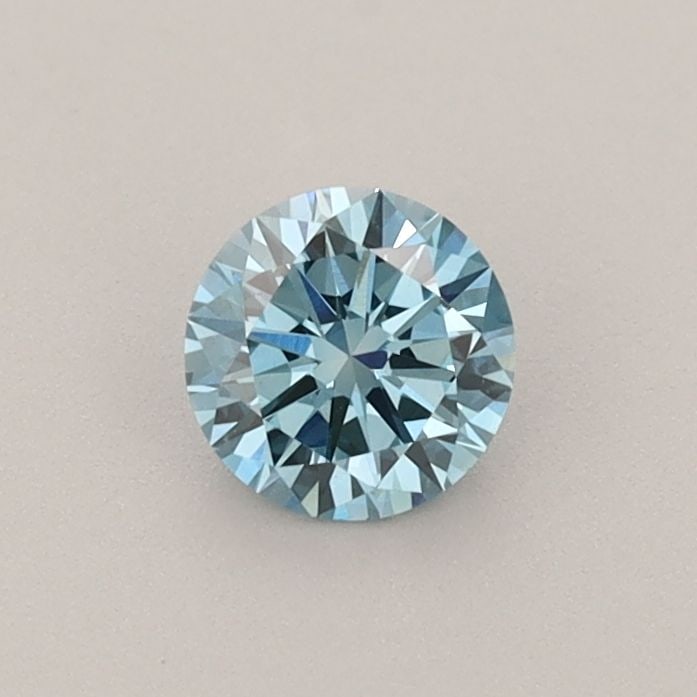 Loose Diamond - ROUND 0.41ct Fancy Vivid Blue VVS2: Loose Diamond - ROUND 0.41ct Fancy Vivid Blue VVS2 Source: This is a real non-mined Diamond that has been grown in a lab Shape: ROUND Carats: 0.41 Color: Fancy Vivid Blue Certification: IGI Video: