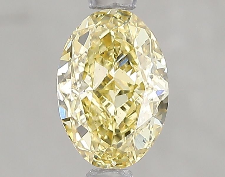 Loose Diamond - OVAL 1.08ct Fancy Intense Yellow SI1: Loose Diamond - OVAL 1.08ct Fancy Intense Yellow SI1 Source: This is a real non-mined Diamond that has been grown in a lab Shape: OVAL Carats: 1.08 Color: Fancy Intense Yellow Certification: IGI Video
