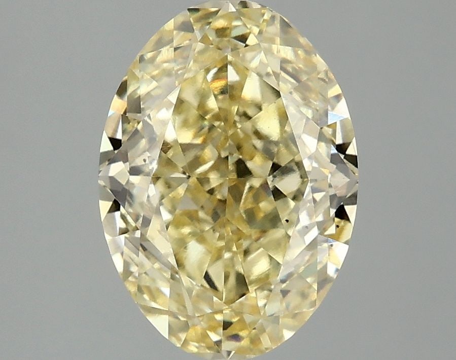 Loose Diamond - OVAL 3.06ct Fancy Vivid Yellow VS2: Loose Diamond - OVAL 3.06ct Fancy Vivid Yellow VS2 Source: This is a real non-mined Diamond that has been grown in a lab Shape: OVAL Carats: 3.06 Color: Fancy Vivid Yellow Certification: IGI Video: