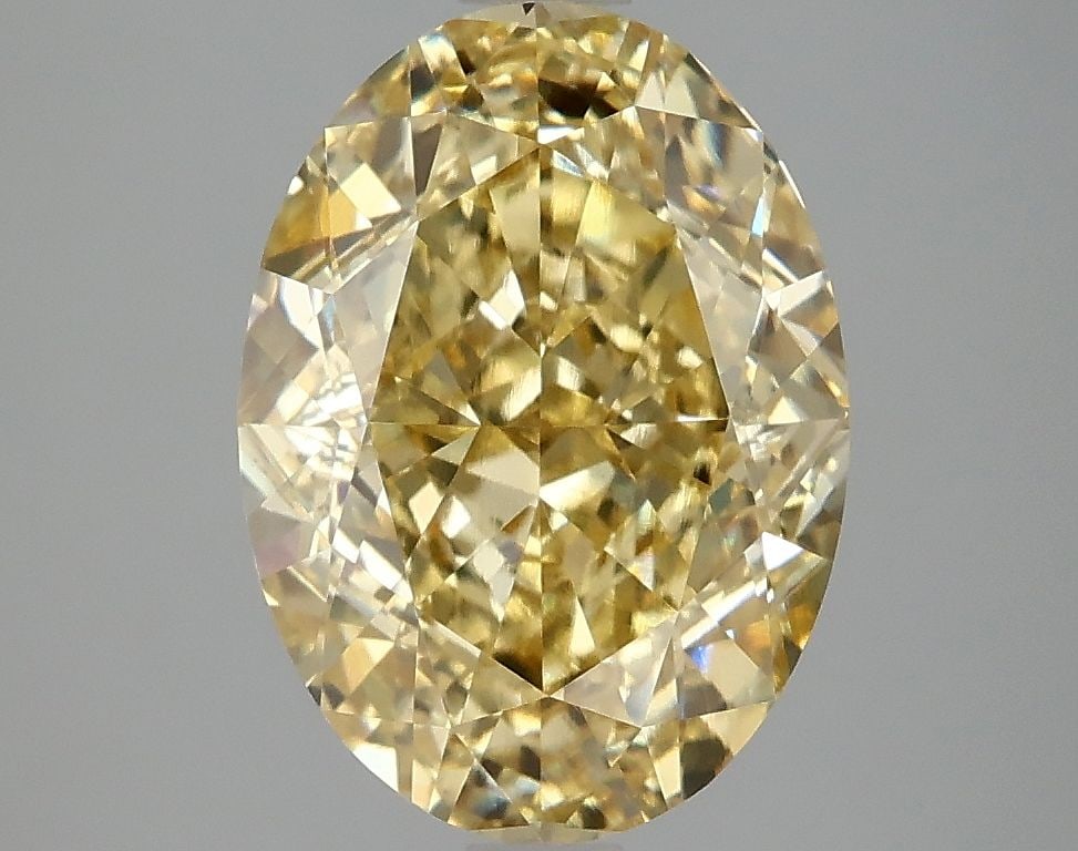 Loose Diamond - OVAL 4.07ct Fancy Intense Yellow VS1: Loose Diamond - OVAL 4.07ct Fancy Intense Yellow VS1 Source: This is a real non-mined Diamond that has been grown in a lab Shape: OVAL Carats: 4.07 Color: Fancy Intense Yellow Certification: IGI Video