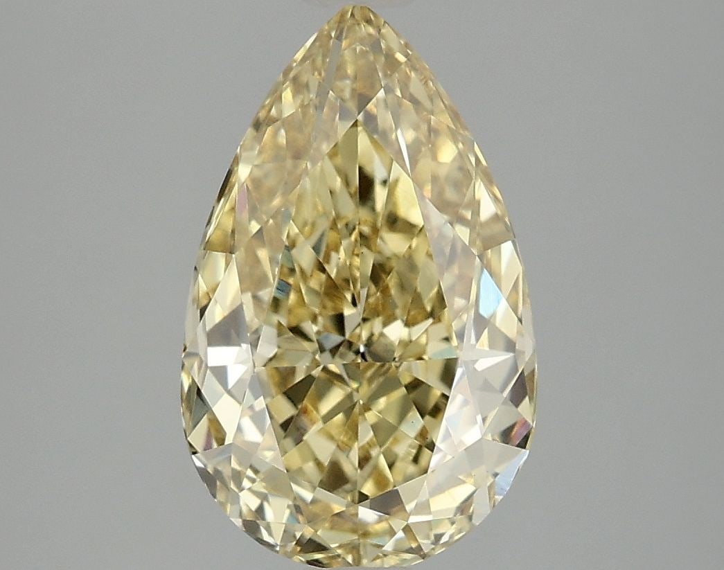 Loose Diamond - PEAR 3.09ct Fancy Vivid Yellow VS1: Loose Diamond - PEAR 3.09ct Fancy Vivid Yellow VS1 Source: This is a real non-mined Diamond that has been grown in a lab Shape: PEAR Carats: 3.09 Color: Fancy Vivid Yellow Certification: IGI Video: