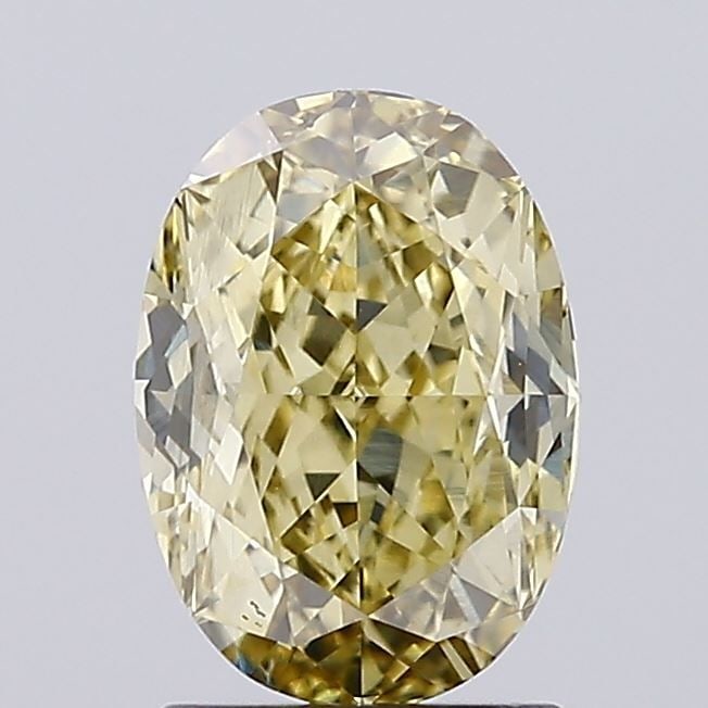 Loose Diamond - OVAL 1.74ct Fancy Yellow VS1: Loose Diamond - OVAL 1.74ct Fancy Yellow VS1 Source: This is a real non-mined Diamond that has been grown in a lab Shape: OVAL Carats: 1.74 Color: Fancy Yellow Certification: IGI Video: