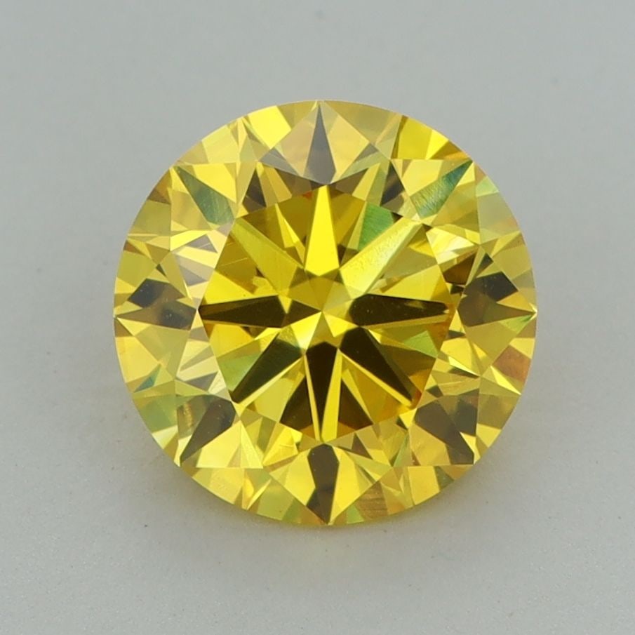 Loose Diamond - ROUND 2.14ct Fancy Vivid Yellow VVS2: Loose Diamond - ROUND 2.14ct Fancy Vivid Yellow VVS2 Source: This is a real non-mined Diamond that has been grown in a lab Shape: ROUND Carats: 2.14 Color: Fancy Vivid Yellow Certification: IGI Additi