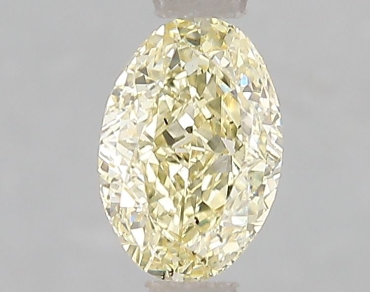 Loose Diamond - OVAL 1.1ct Fancy Yellow SI1: Loose Diamond - OVAL 1.1ct Fancy Yellow SI1 Source: This is a real non-mined Diamond that has been grown in a lab Shape: OVAL Carats: 1.1 Color: Fancy Yellow Certification: IGI Video: