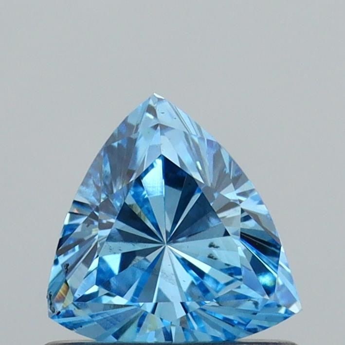 Loose Diamond - TRIANGULAR 0.58ct Fancy Vivid Blue VS1: Loose Diamond - TRIANGULAR 0.58ct Fancy Vivid Blue VS1 Source: This is a real non-mined Diamond that has been grown in a lab Shape: TRIANGULAR Carats: 0.58 Color: Fancy Vivid Blue Certification: IGI