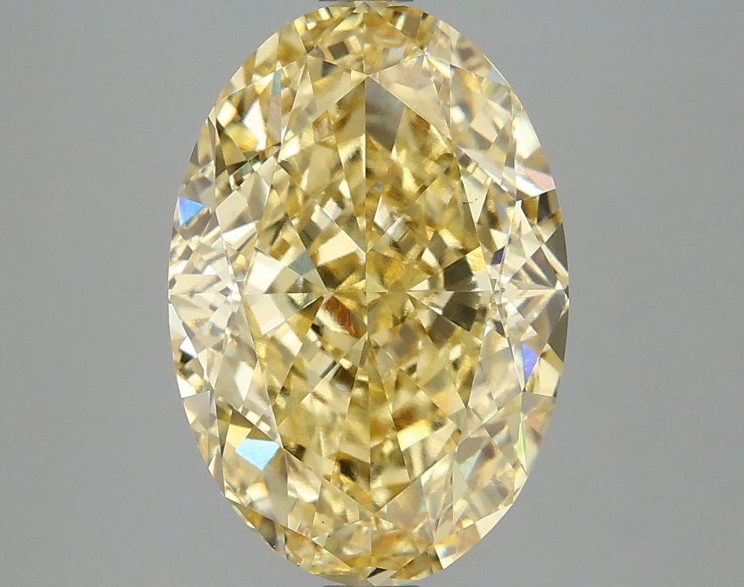 Loose Diamond - OVAL 5.08ct Fancy Vivid Yellow VS1: Loose Diamond - OVAL 5.08ct Fancy Vivid Yellow VS1 Source: This is a real non-mined Diamond that has been grown in a lab Shape: OVAL Carats: 5.08 Color: Fancy Vivid Yellow Certification: IGI Video: