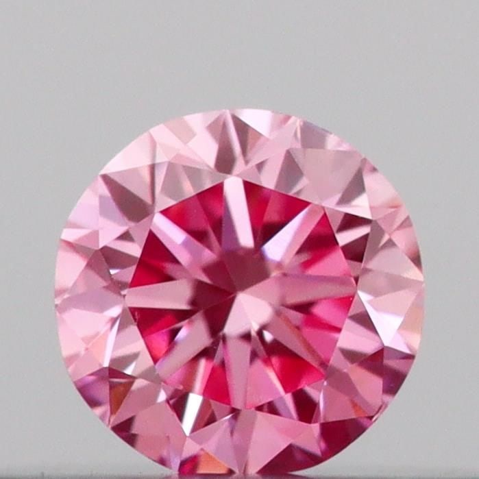 Loose Diamond - ROUND 0.11ct Fancy Vivid Pink VS1: Loose Diamond - ROUND 0.11ct Fancy Vivid Pink VS1 Source: This is a real non-mined Diamond that has been grown in a lab Shape: ROUND Carats: 0.11 Color: Fancy Vivid Pink Certification: IGI Video: