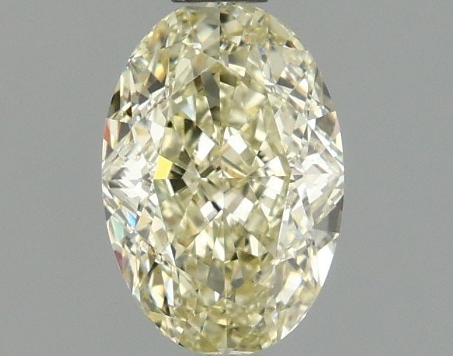 Loose Diamond - OVAL 1.04ct Fancy Light Yellow VS1: Loose Diamond - OVAL 1.04ct Fancy Light Yellow VS1 Source: This is a real non-mined Diamond that has been grown in a lab Shape: OVAL Carats: 1.04 Color: Fancy Light Yellow Certification: IGI Video: