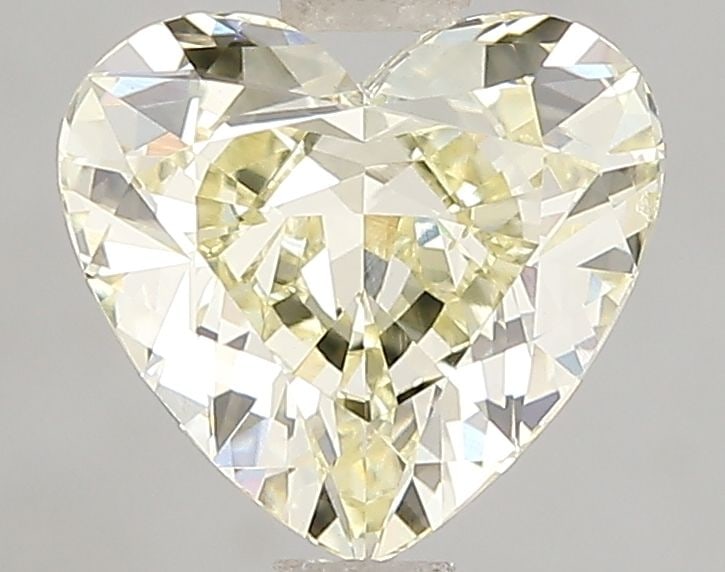 Loose Diamond - HEART 2.0ct Fancy Yellow VS2: Loose Diamond - HEART 2.0ct Fancy Yellow VS2 Source: This is a real non-mined Diamond that has been grown in a lab Shape: HEART Carats: 2.0 Color: Fancy Yellow Certification: IGI Video: