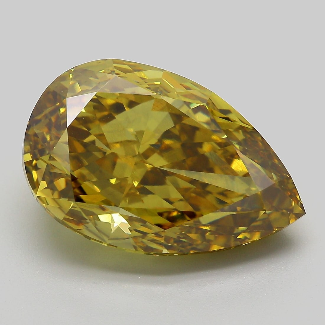 Loose Diamond - PEAR 14.02ct Fancy Vivid Gray Yellow VS1: Loose Diamond - PEAR 14.02ct Fancy Vivid Gray Yellow VS1 Source: This is a real non-mined Diamond that has been grown in a lab Shape: PEAR Carats: 14.02 Color: Fancy Vivid Gray Yellow Certification: I