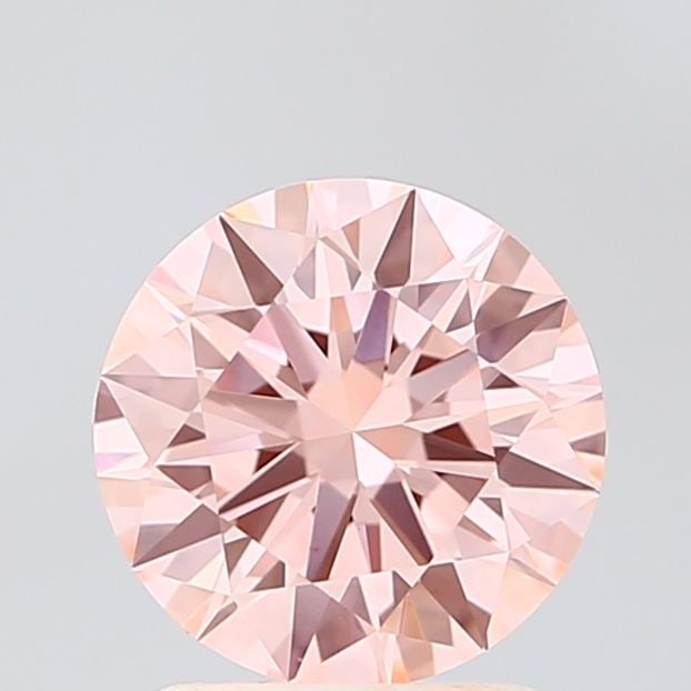 Ideal Loose Diamond - ROUND 1.52ct Fancy Vivid Pink VS1: Ideal Loose Diamond - ROUND 1.52ct Fancy Vivid Pink VS1 Source: This is a real non-mined Diamond that has been grown in a lab Shape: ROUND Carats: 1.52 Color: Fancy Vivid Pink Certification: IGI Video