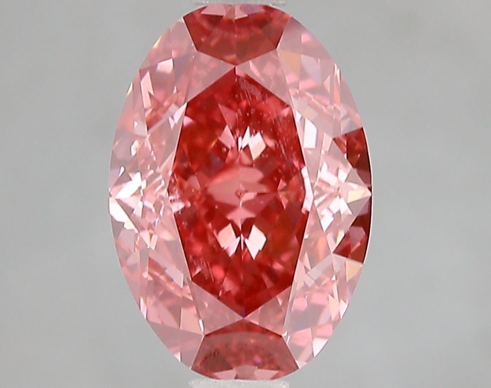Loose Diamond - OVAL 2.7ct Fancy Vivid Pink VS1: Loose Diamond - OVAL 2.7ct Fancy Vivid Pink VS1 Source: This is a real non-mined Diamond that has been grown in a lab Shape: OVAL Carats: 2.7 Color: Fancy Vivid Pink Certification: IGI Video: