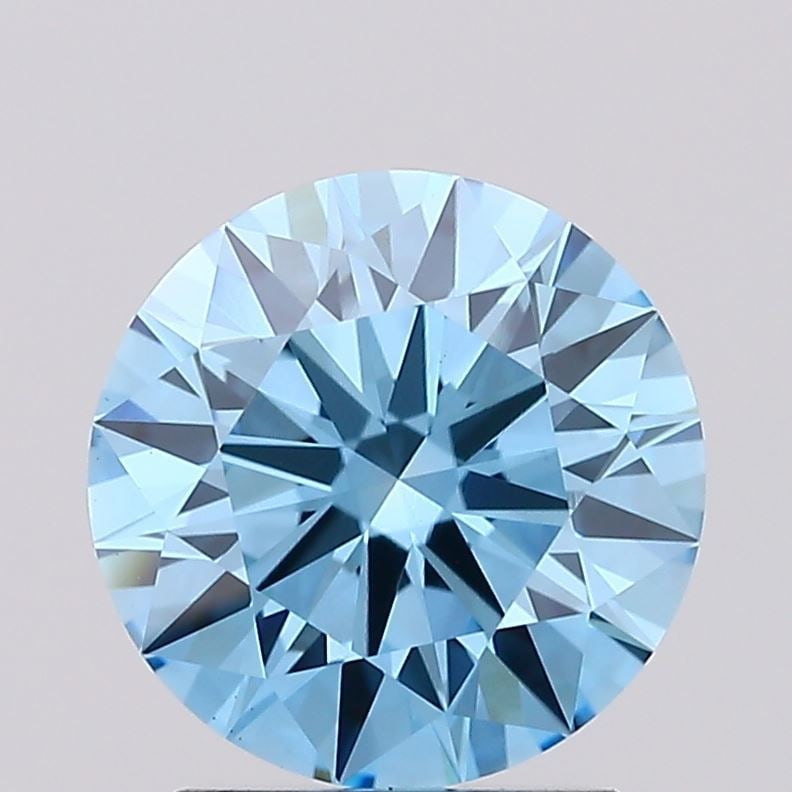 Ideal Loose Diamond - ROUND 1.77ct Fancy Vivid Blue VS1: Ideal Loose Diamond - ROUND 1.77ct Fancy Vivid Blue VS1 Source: This is a real non-mined Diamond that has been grown in a lab Shape: ROUND Carats: 1.77 Color: Fancy Vivid Blue Certification: IGI Video
