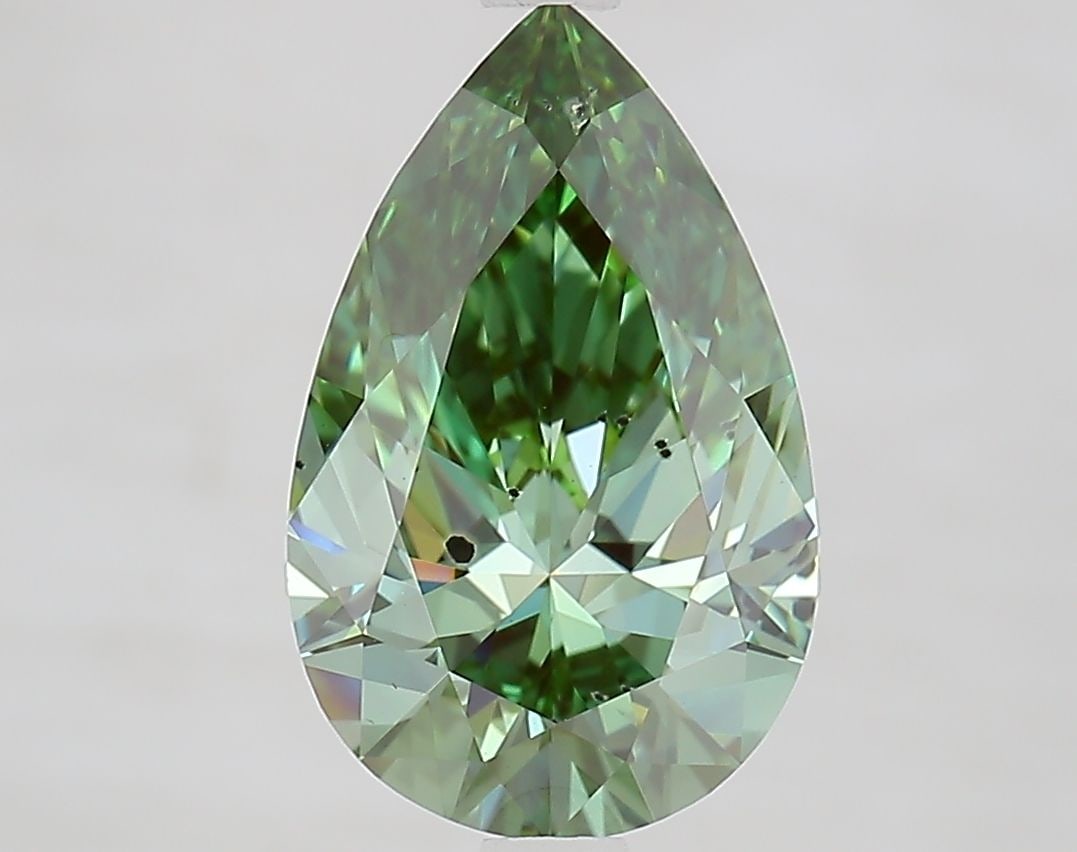 Loose Diamond - PEAR 2.73ct Fancy Vivid Green SI1: Loose Diamond - PEAR 2.73ct Fancy Vivid Green SI1 Source: This is a real non-mined Diamond that has been grown in a lab Shape: PEAR Carats: 2.73 Color: Fancy Vivid Green Certification: IGI Video: