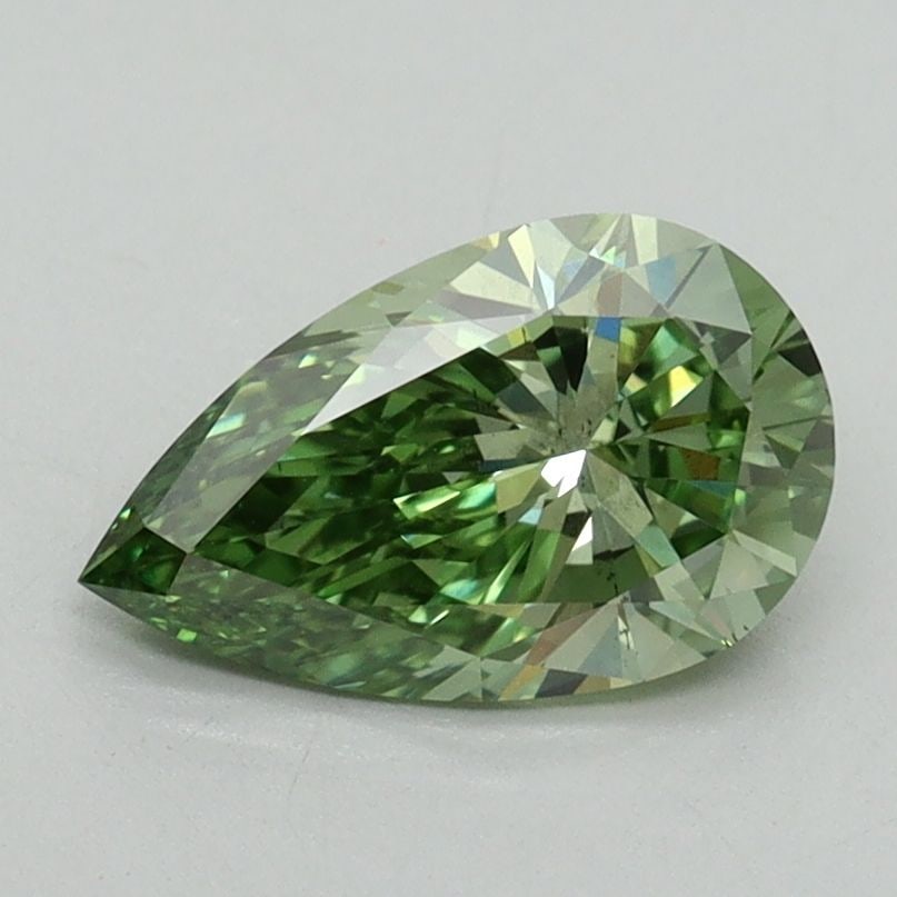 Loose Diamond - PEAR 1.12ct Fancy Vivid Green VS2: Loose Diamond - PEAR 1.12ct Fancy Vivid Green VS2 Source: This is a real non-mined Diamond that has been grown in a lab Shape: PEAR Carats: 1.12 Color: Fancy Vivid Green Certification: IGI Video: