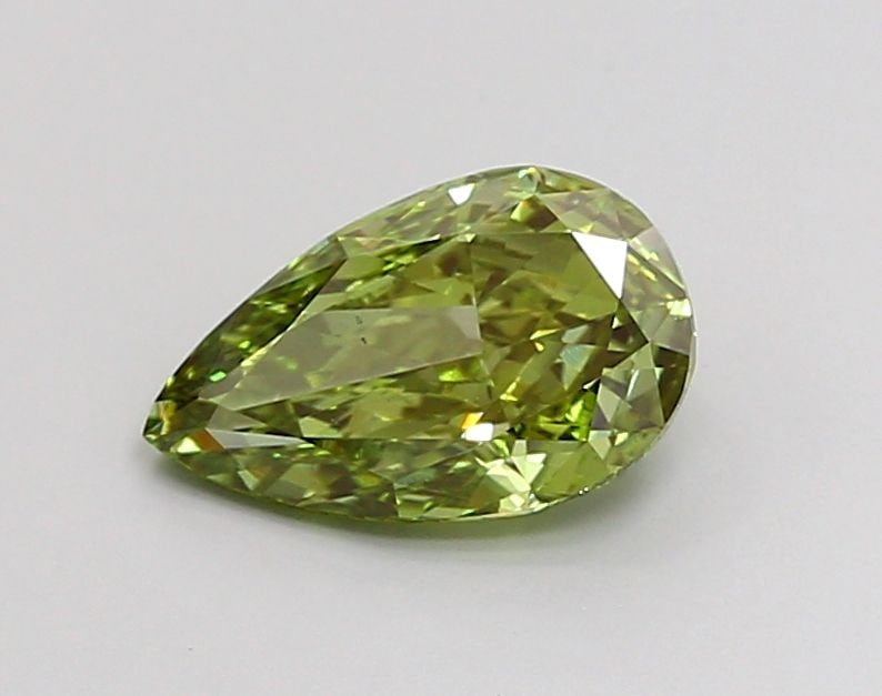 Loose Diamond - PEAR 1.31ct Fancy Vivid Green VS2: Loose Diamond - PEAR 1.31ct Fancy Vivid Green VS2 Source: This is a real non-mined Diamond that has been grown in a lab Shape: PEAR Carats: 1.31 Color: Fancy Vivid Green Certification: IGI Video: