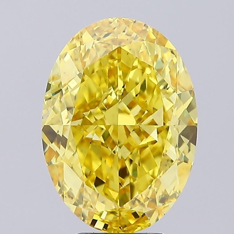 Loose Diamond - OVAL 8.02ct Fancy Vivid Yellow VS2: Loose Diamond - OVAL 8.02ct Fancy Vivid Yellow VS2 Source: This is a real non-mined Diamond that has been grown in a lab Shape: OVAL Carats: 8.02 Color: Fancy Vivid Yellow Certification: IGI Video: