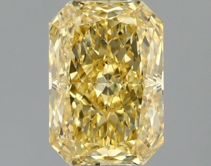 Loose Diamond - RADIANT 1.5ct Fancy Vivid Yellow VS2: Loose Diamond - RADIANT 1.5ct Fancy Vivid Yellow VS2 Source: This is a real non-mined Diamond that has been grown in a lab Shape: RADIANT Carats: 1.5 Color: Fancy Vivid Yellow Certification: IGI Video