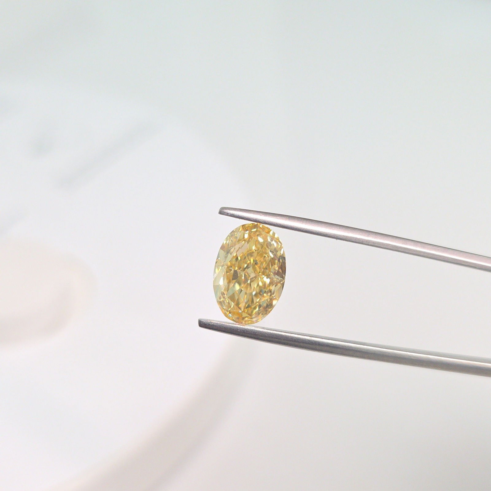 Loose Diamond - OVAL 3.03ct Fancy Vivid Yellow VS1: Loose Diamond - OVAL 3.03ct Fancy Vivid Yellow VS1 Source: This is a real non-mined Diamond that has been grown in a lab Shape: OVAL Carats: 3.03 Color: Fancy Vivid Yellow Certification: IGI Video: