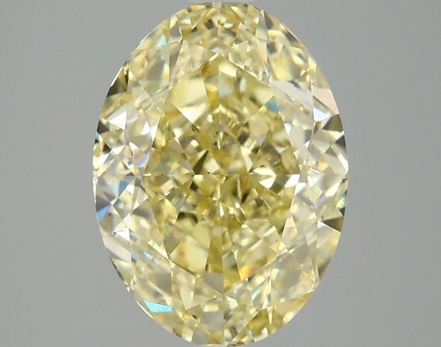 Loose Diamond - OVAL 3.1ct Fancy Intense Yellow VS2: Loose Diamond - OVAL 3.1ct Fancy Intense Yellow VS2 Source: This is a real non-mined Diamond that has been grown in a lab Shape: OVAL Carats: 3.1 Color: Fancy Intense Yellow Certification: IGI Video: