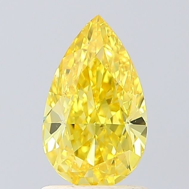Loose Diamond - PEAR 1.37ct Fancy Vivid Yellow VS1: Loose Diamond - PEAR 1.37ct Fancy Vivid Yellow VS1 Source: This is a real non-mined Diamond that has been grown in a lab Shape: PEAR Carats: 1.37 Color: Fancy Vivid Yellow Certification: IGI Video: