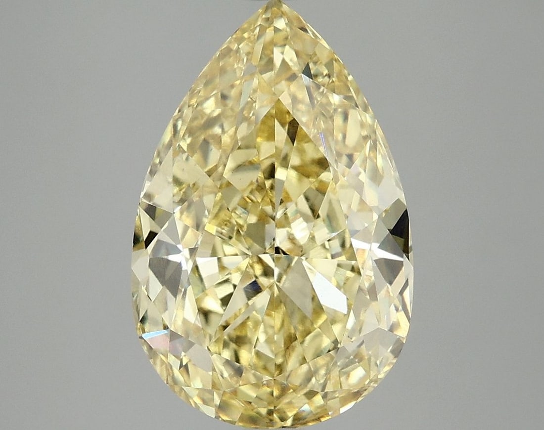Loose Diamond - PEAR 5.01ct Fancy Vivid Yellow VS1: Loose Diamond - PEAR 5.01ct Fancy Vivid Yellow VS1 Source: This is a real non-mined Diamond that has been grown in a lab Shape: PEAR Carats: 5.01 Color: Fancy Vivid Yellow Certification: IGI Video: