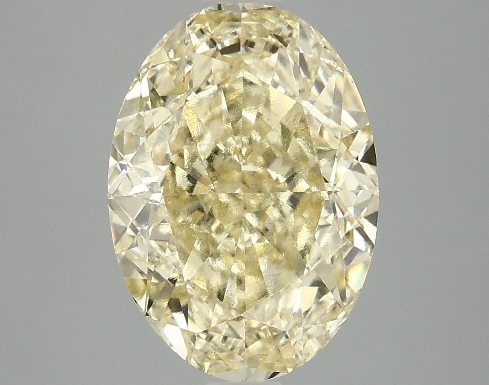 Loose Diamond - OVAL 3.96ct Fancy Intense Yellow VS1: Loose Diamond - OVAL 3.96ct Fancy Intense Yellow VS1 Source: This is a real non-mined Diamond that has been grown in a lab Shape: OVAL Carats: 3.96 Color: Fancy Intense Yellow Certification: IGI Video