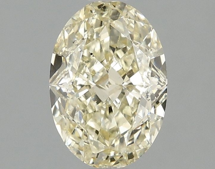 Loose Diamond - OVAL 1.59ct Fancy Intense Yellow VS2: Loose Diamond - OVAL 1.59ct Fancy Intense Yellow VS2 Source: This is a real non-mined Diamond that has been grown in a lab Shape: OVAL Carats: 1.59 Color: Fancy Intense Yellow Certification: IGI Video