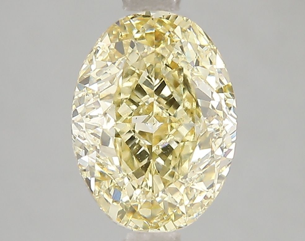 Loose Diamond - OVAL 3.01ct Fancy Intense Yellow VS2: Loose Diamond - OVAL 3.01ct Fancy Intense Yellow VS2 Source: This is a real non-mined Diamond that has been grown in a lab Shape: OVAL Carats: 3.01 Color: Fancy Intense Yellow Certification: IGI Video