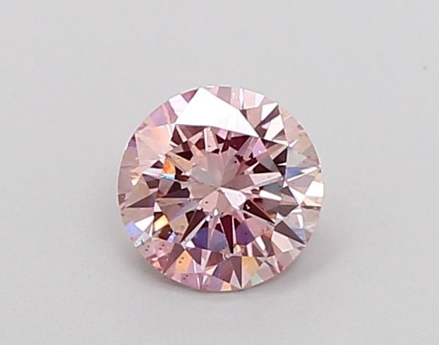 Loose Diamond - ROUND 0.6ct Fancy Light Pink VS2: Loose Diamond - ROUND 0.6ct Fancy Light Pink VS2 Source: This is a real non-mined Diamond that has been grown in a lab Shape: ROUND Carats: 0.6 Color: Fancy Light Pink Certification: IGI Video:
