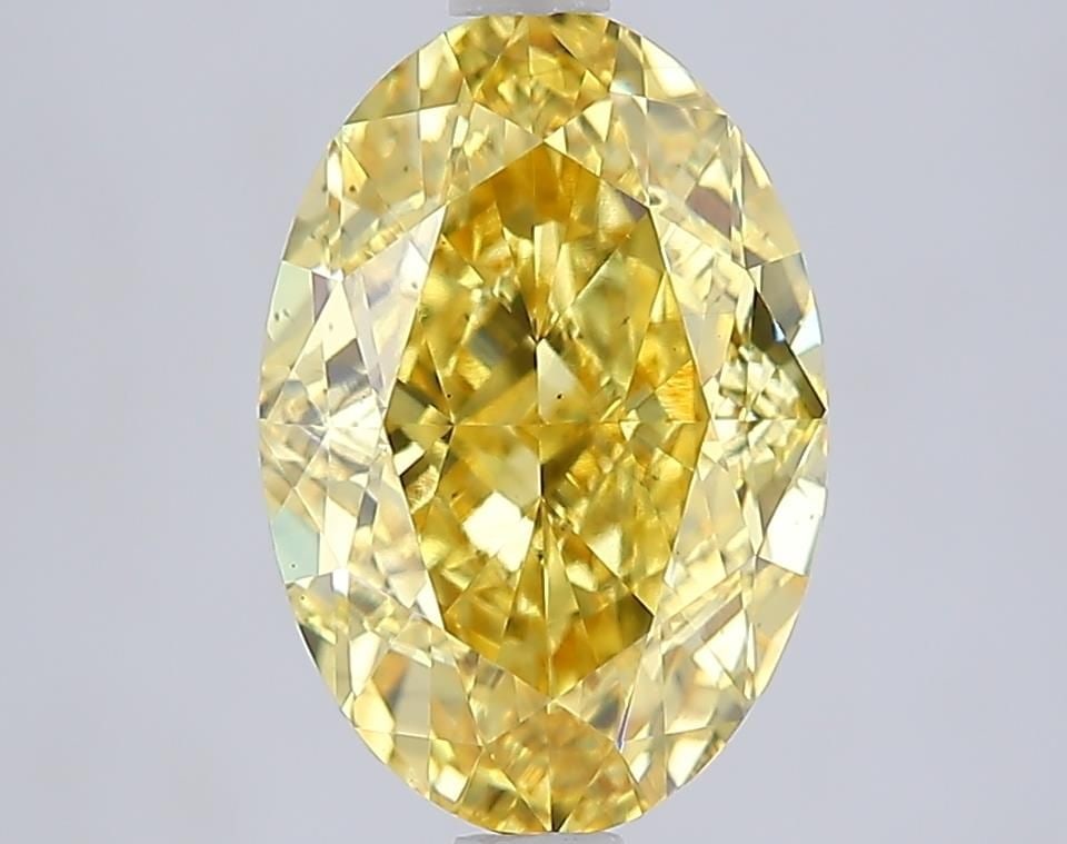 Loose Diamond - OVAL 3.01ct Fancy Vivid Yellow VS2: Loose Diamond - OVAL 3.01ct Fancy Vivid Yellow VS2 Source: This is a real non-mined Diamond that has been grown in a lab Shape: OVAL Carats: 3.01 Color: Fancy Vivid Yellow Certification: IGI Video: