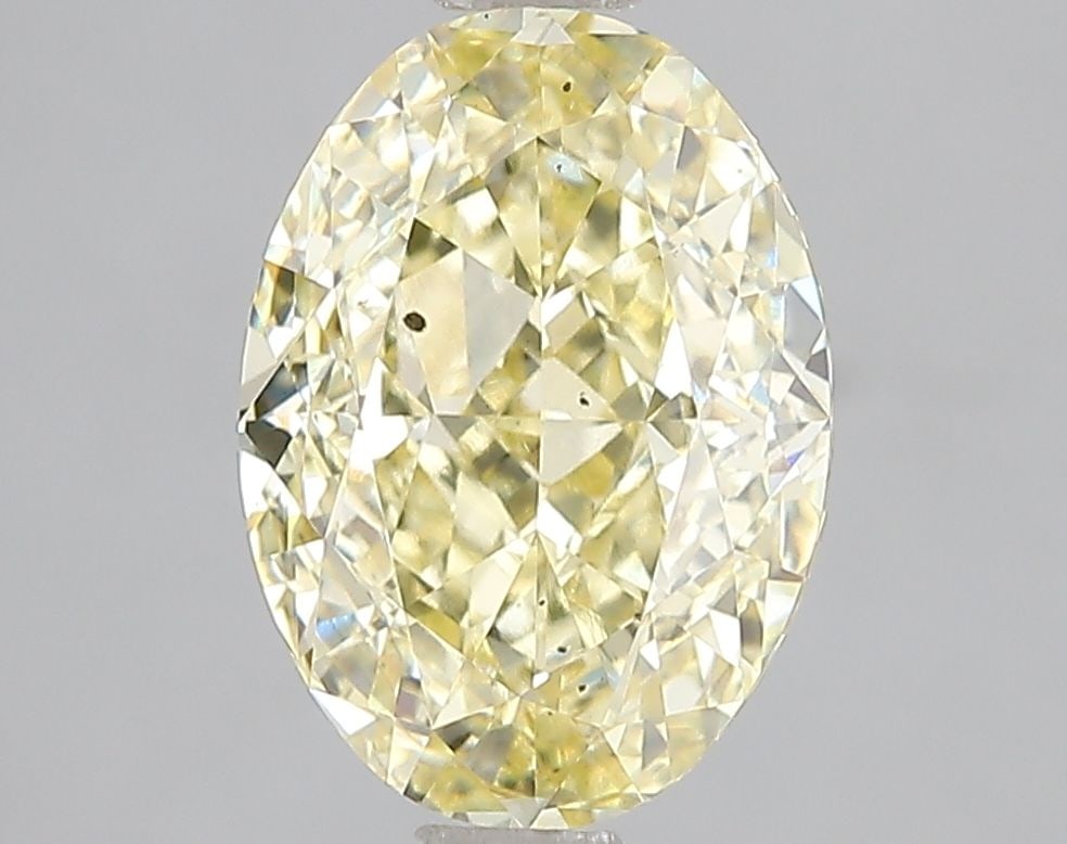 Loose Diamond - OVAL 3.06ct Fancy Intense Yellow SI1: Loose Diamond - OVAL 3.06ct Fancy Intense Yellow SI1 Source: This is a real non-mined Diamond that has been grown in a lab Shape: OVAL Carats: 3.06 Color: Fancy Intense Yellow Certification: IGI Video