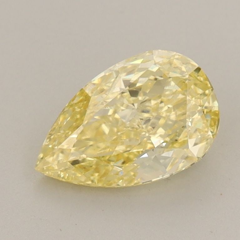 Loose Diamond - PEAR 1.04ct Fancy Vivid Yellow VS1: Loose Diamond - PEAR 1.04ct Fancy Vivid Yellow VS1 Source: This is a real non-mined Diamond that has been grown in a lab Shape: PEAR Carats: 1.04 Color: Fancy Vivid Yellow Certification: IGI Video: