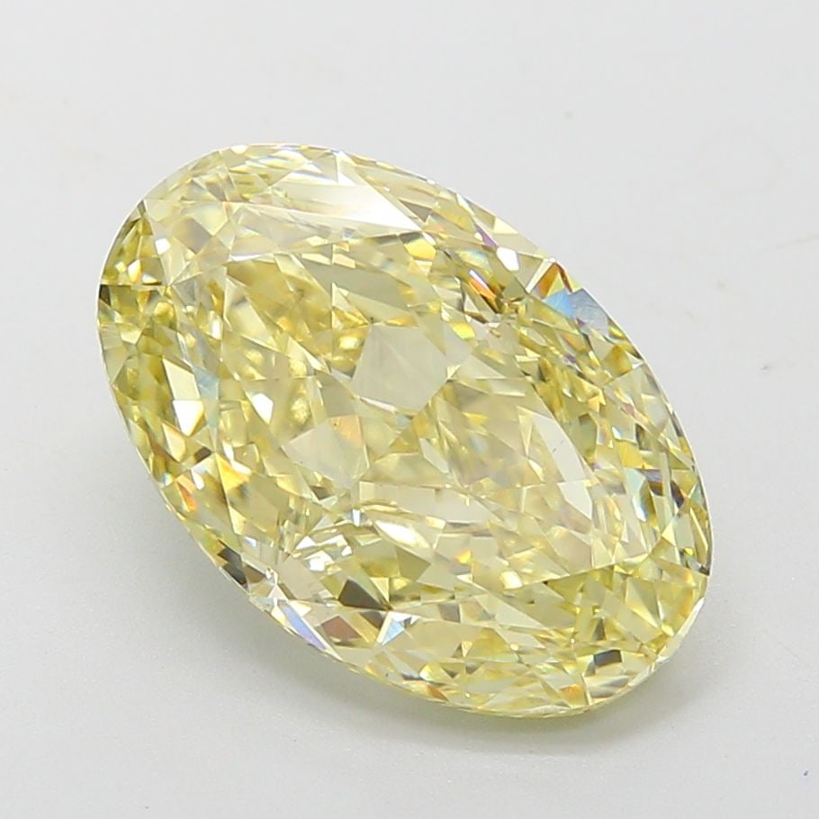 Loose Diamond - OVAL 6.2ct Fancy Yellow VS2: Loose Diamond - OVAL 6.2ct Fancy Yellow VS2 Source: This is a real non-mined Diamond that has been grown in a lab Shape: OVAL Carats: 6.2 Color: Fancy Yellow Certification: IGI Video: