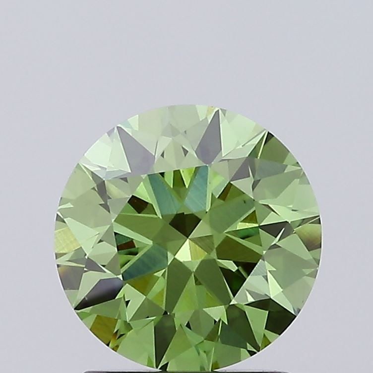 Ideal Loose Diamond - ROUND 1.36ct Fancy Vivid Green VS1: Ideal Loose Diamond - ROUND 1.36ct Fancy Vivid Green VS1 Source: This is a real non-mined Diamond that has been grown in a lab Shape: ROUND Carats: 1.36 Color: Fancy Vivid Green Certification: IGI Vid